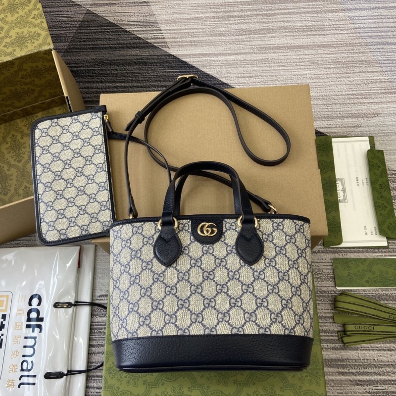 G*u*i shopping bags